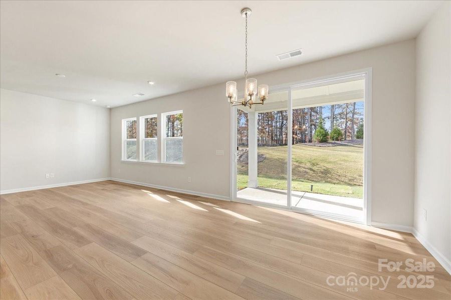 Dining Space Featuring Sliding Glass Doors to Outdoor Living.