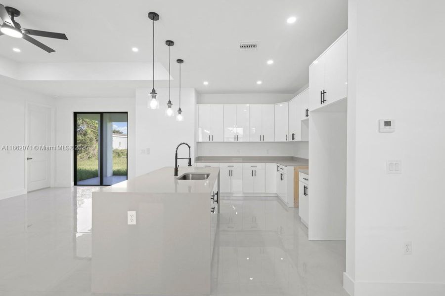 ACTUAL KITCHEN SPACE INCORPORATED TO OPEN FLOOR PLAN