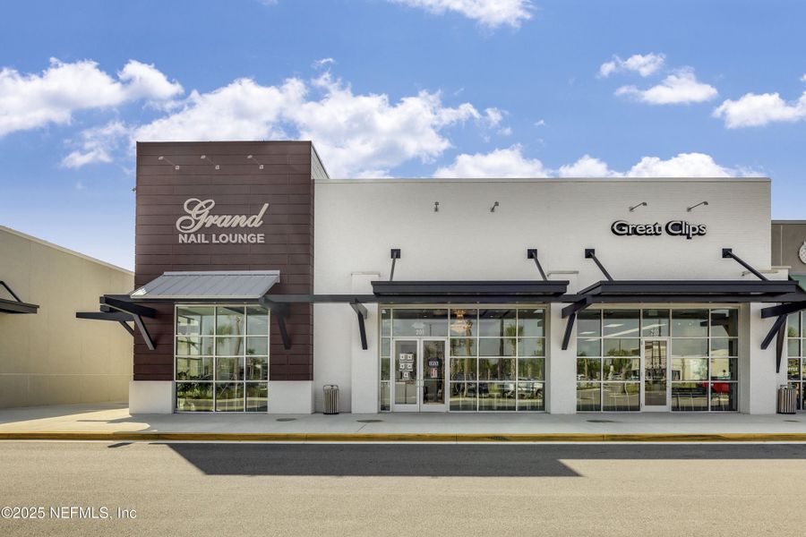 Front exterior of a new home in , Jacksonville, FL, highlighting curb appeal (Image 1).