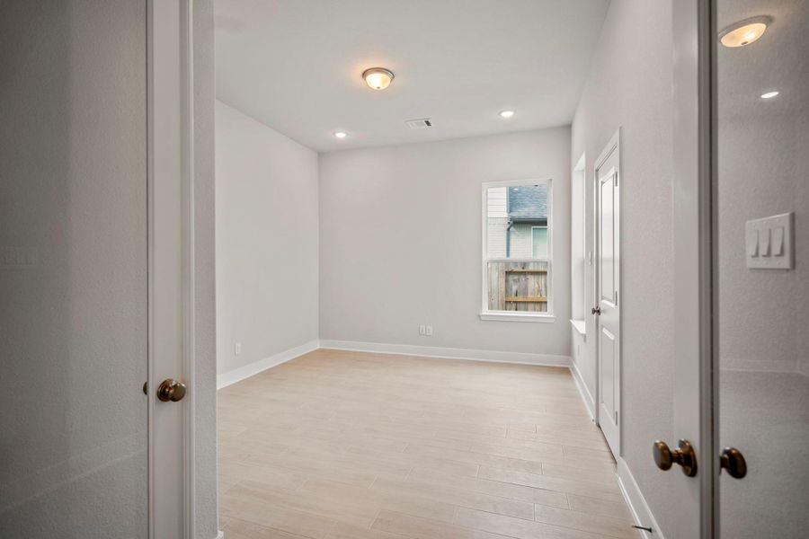 Spacious, unfurnished interior of a new home in ARTAVIA 55' Lots, Conroe (Image 37).