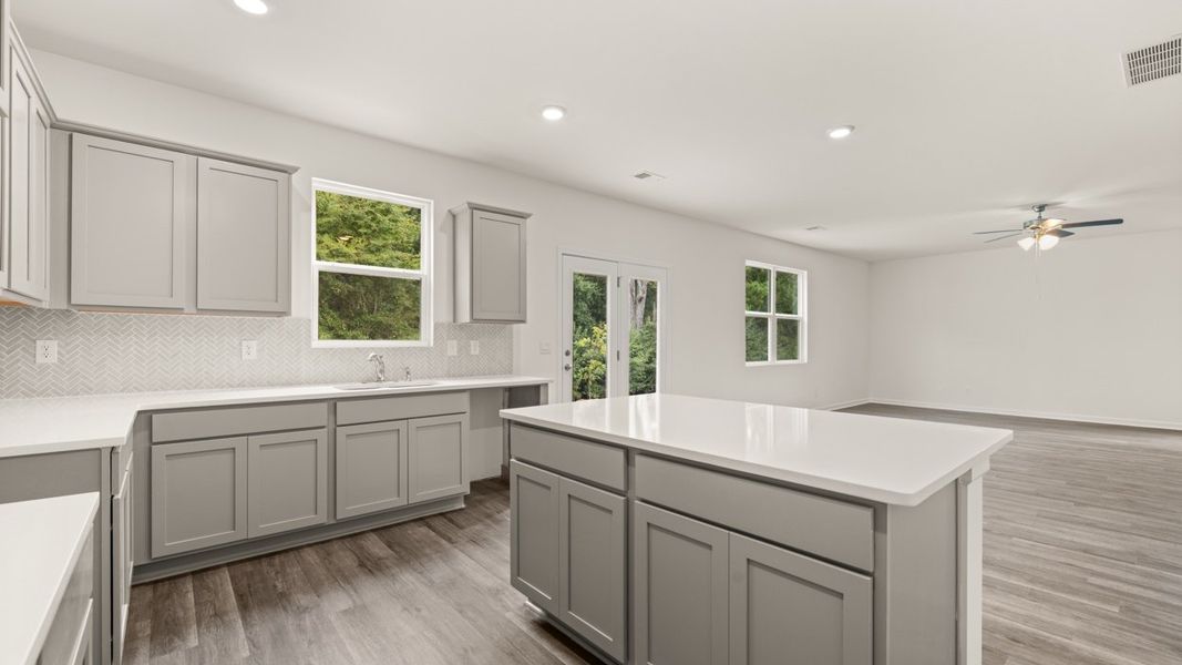 Representative furnished interior of a home built from the Hanover by D.R. Horton in The Reserve at Calcutta, Stockbridge (Image 6).