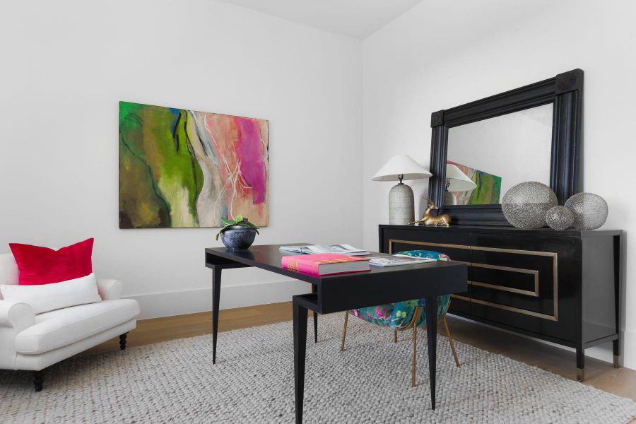 Office area featuring wood finished floors and baseboards Office area featuring wood finished floors and baseboards