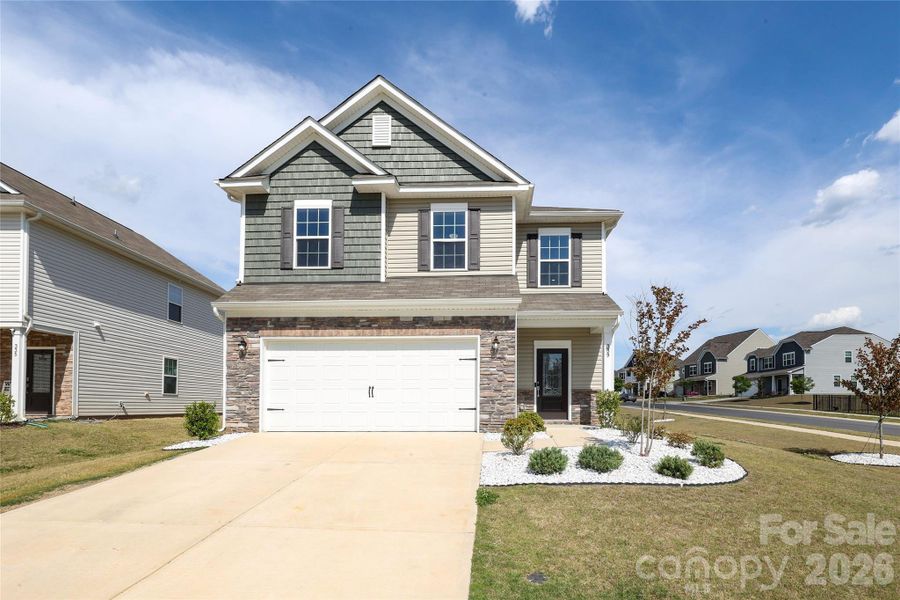 Front exterior of a new home in , Mooresville, NC, highlighting curb appeal (Image 22).