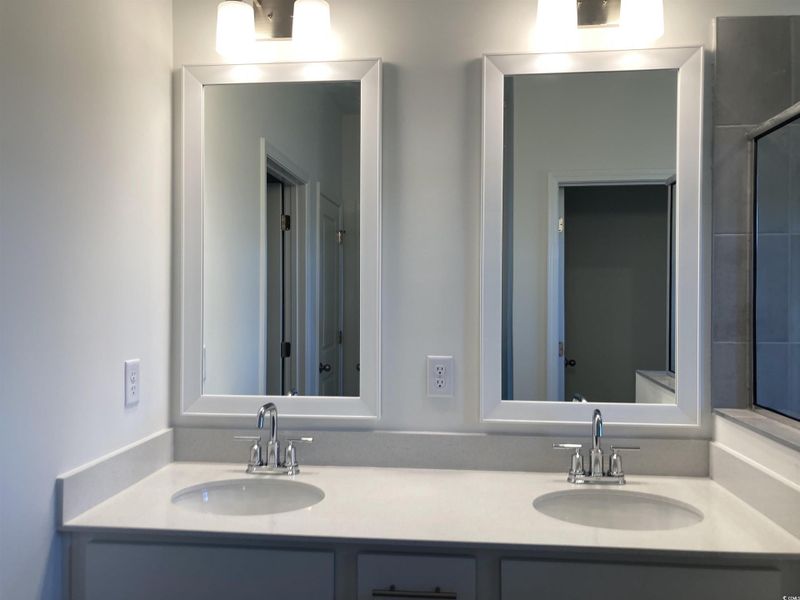 Full bath with double vanity