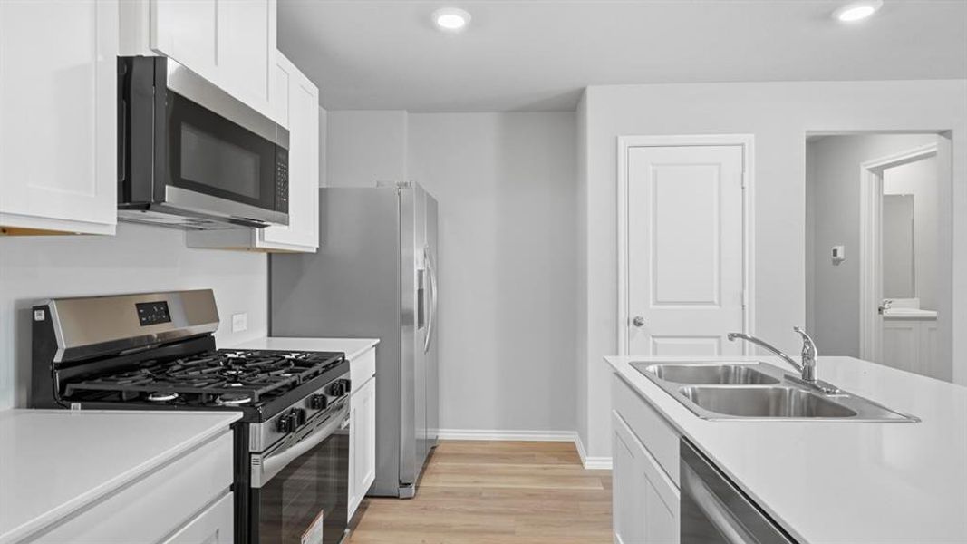 Furnished interior view inside a new home in Sunnycreek, Crowley (Image 8).
