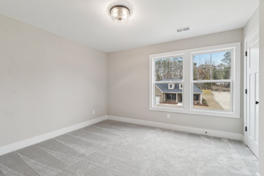 Representative unfurnished interior of a home built from the Ashbourne II by Great Southern Homes in Collins Cove, Chapin (Image 48).