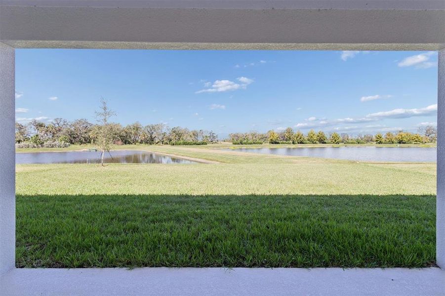 Exterior details and patio area of a home in North River Ranch, Parrish (Image 18).