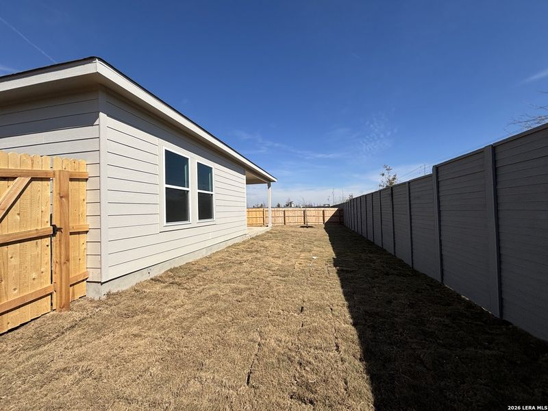 Exterior details and patio area of a home in The Summit at Saddlebrook Ranch 55's, Schertz (Image 3).