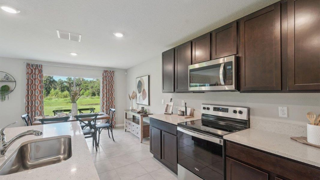 Furnished interior view inside a new home in Abbott Park, Zephyrhills (Image 7).