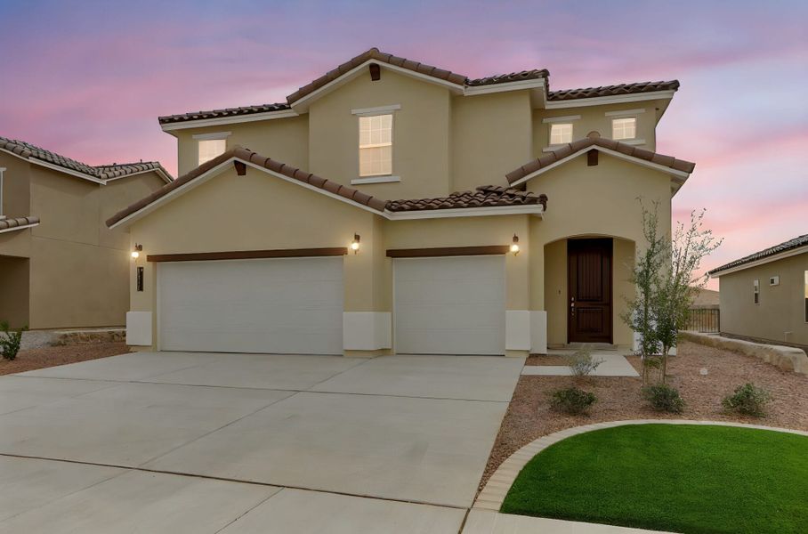 Front exterior of a new home in Emerald Estates, Horizon City, TX, highlighting curb appeal (Image 24). Front exterior of a new home in Emerald Estates, Horizon City, TX, highlighting curb appeal (Image 24).