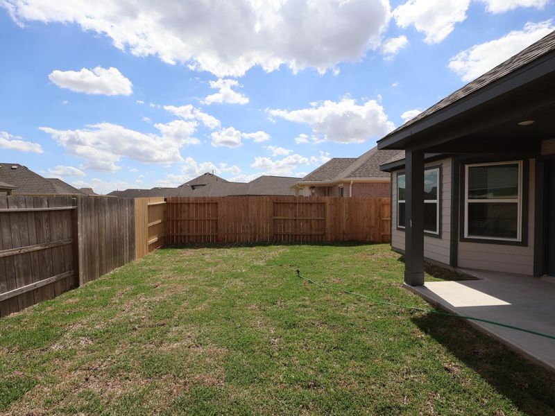 Exterior details and patio area of a home in Marvida, Cypress (Image 19). Exterior details and patio area of a home in Marvida, Cypress (Image 19).
