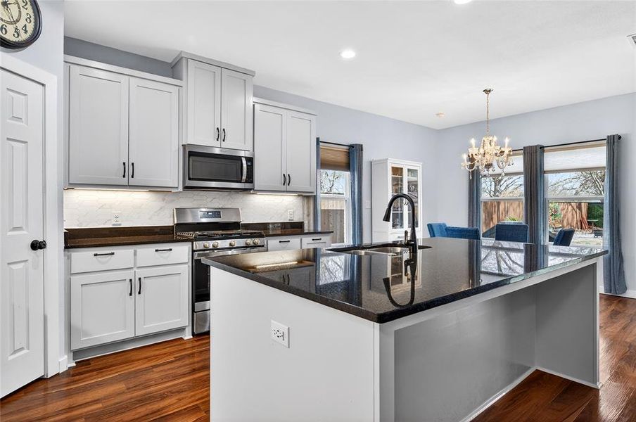 Elegant Kitchen with Undermount Lighting & Island