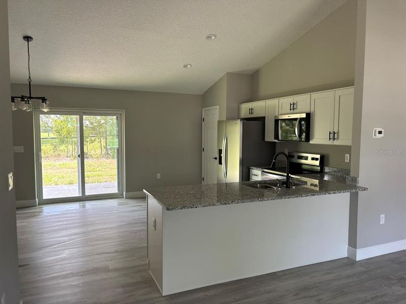 Furnished interior view inside a new home in , Dunnellon (Image 6).