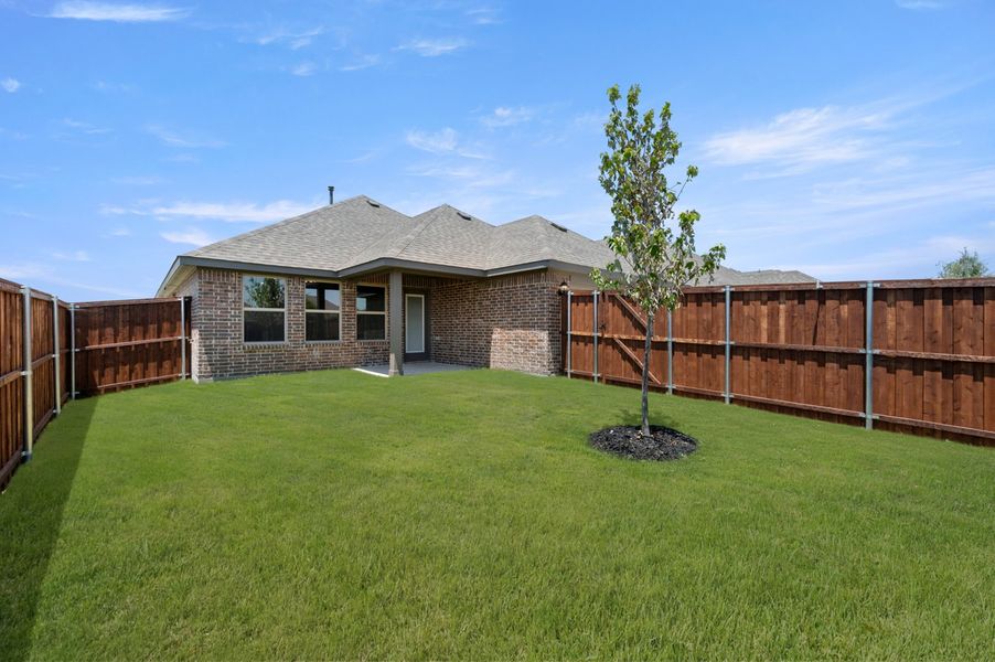 Front exterior of a new home in Redden Farms, Midlothian, TX, highlighting curb appeal (Image 26). Front exterior of a new home in Redden Farms, Midlothian, TX, highlighting curb appeal (Image 26).