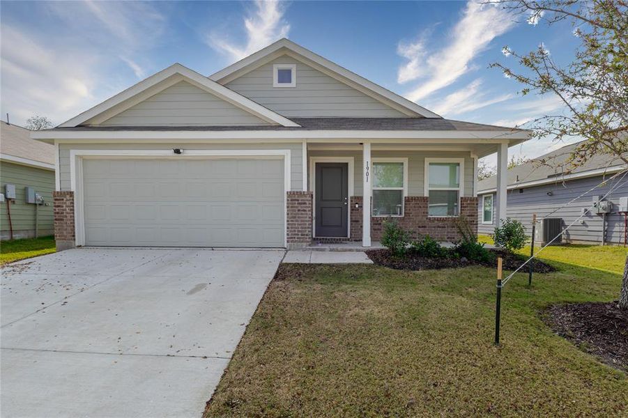 Front exterior of a new home in Preserve at Honey Creek: Watermill Collection, McKinney, TX, highlighting curb appeal (Image 1).