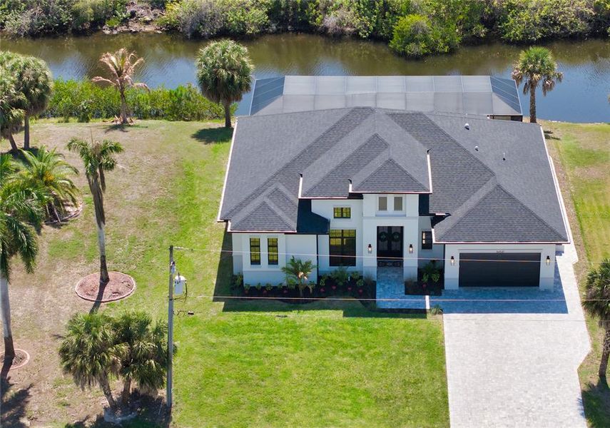 Front exterior of a new home in , Port Charlotte, FL, highlighting curb appeal (Image 26).