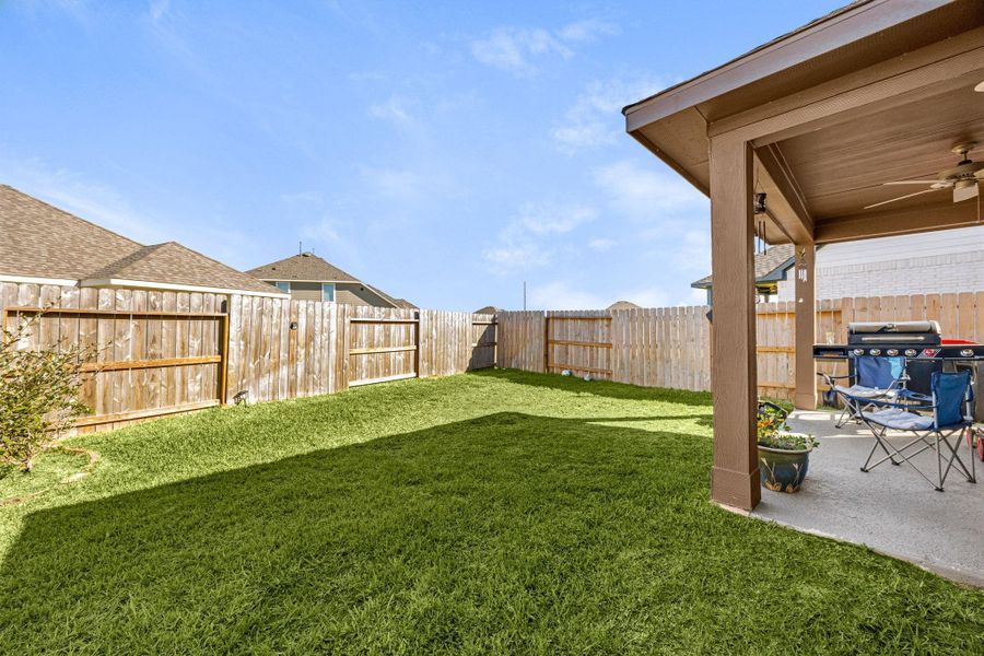 Exterior details and patio area of a home in Marvida, Cypress (Image 22).