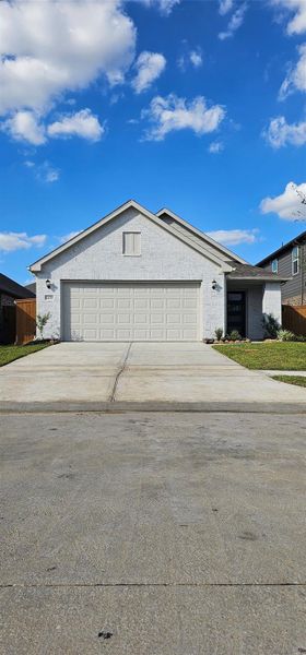Front exterior of a new home in Marvida, Cypress, TX, highlighting curb appeal (Image 1). Front exterior of a new home in Marvida, Cypress, TX, highlighting curb appeal (Image 1).