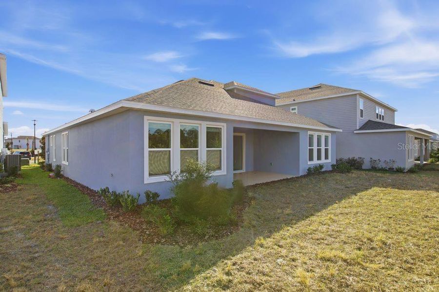 Exterior details and patio area of a home in Center Lake Ranch Community Group Page, St. Cloud (Image 3).