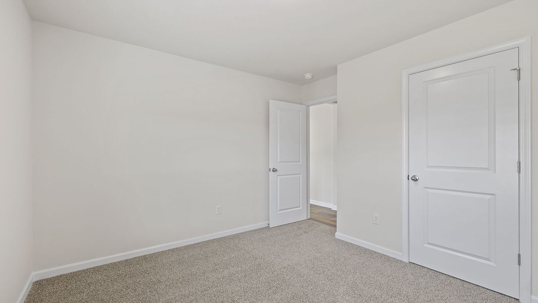 Spacious, unfurnished interior of a new home in Bentley Park, Greenwood (Image 18). Spacious, unfurnished interior of a new home in Bentley Park, Greenwood (Image 18).