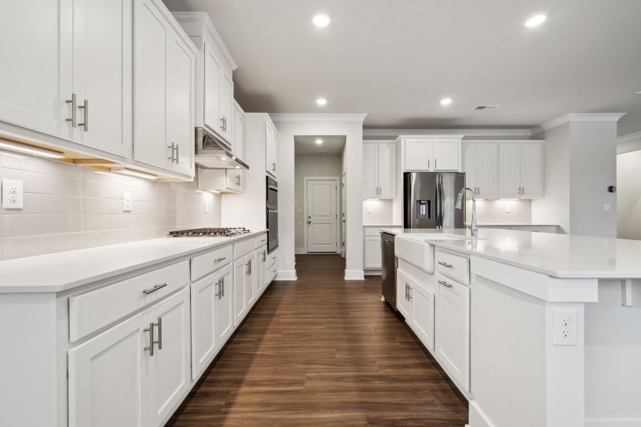 A kitchen with white cabinets. A kitchen with white cabinets.