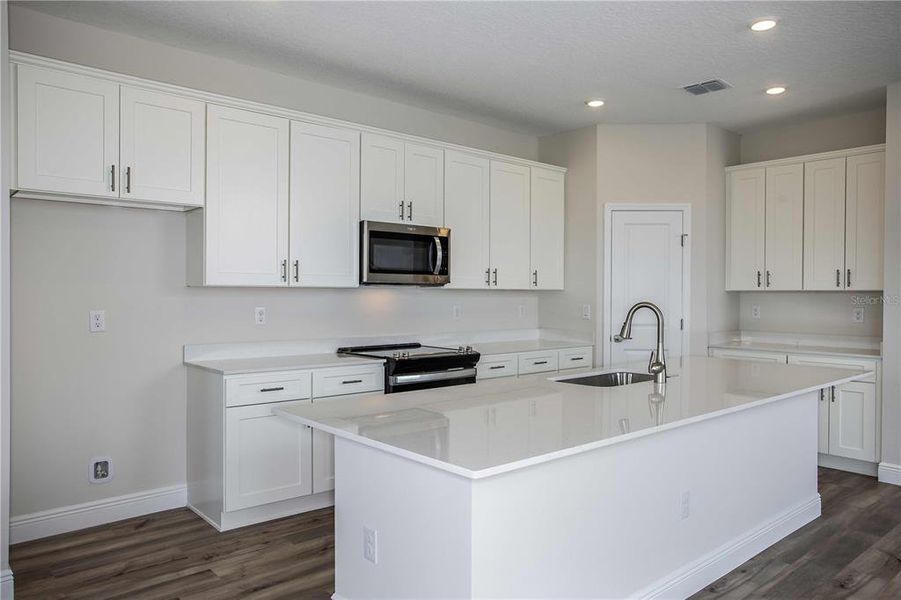 Furnished interior view inside a new home in Pasadena Woods, Wesley Chapel (Image 2). Furnished interior view inside a new home in Pasadena Woods, Wesley Chapel (Image 2).