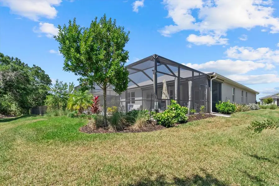 Front exterior of a new home in , Englewood, FL, highlighting curb appeal (Image 26).