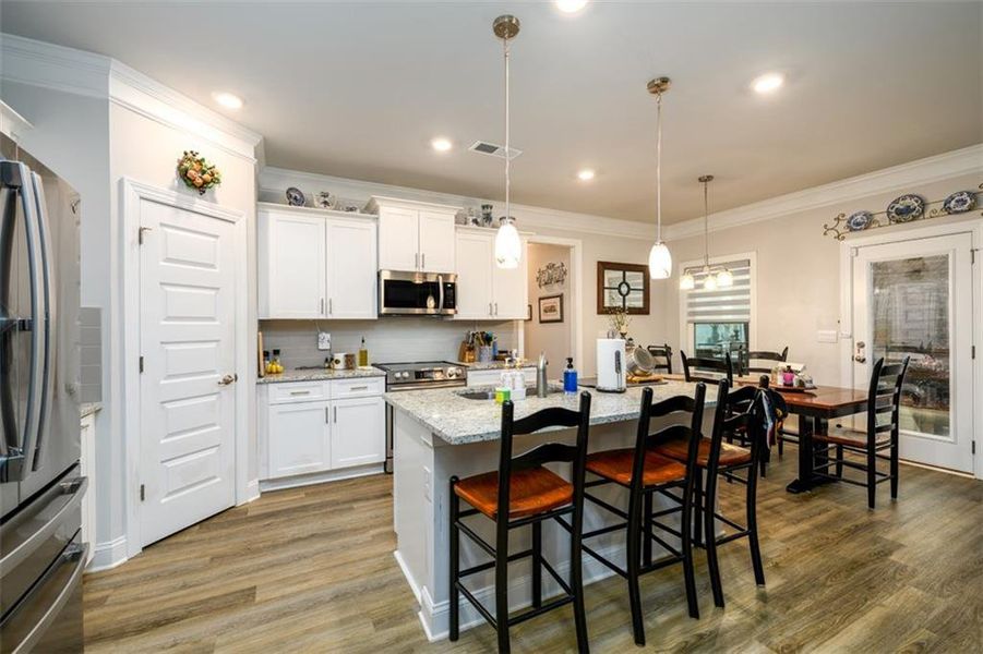 Furnished interior view inside a new home in Holiday Pines, Buford (Image 37).
