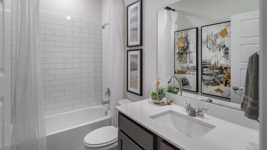 Representative furnished interior of a home built from the Copaiba by D.R. Horton in Windchime, Celina (Image 11).