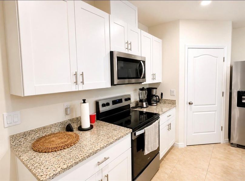 Furnished interior view inside a new home in , Kissimmee (Image 10). Furnished interior view inside a new home in , Kissimmee (Image 10).