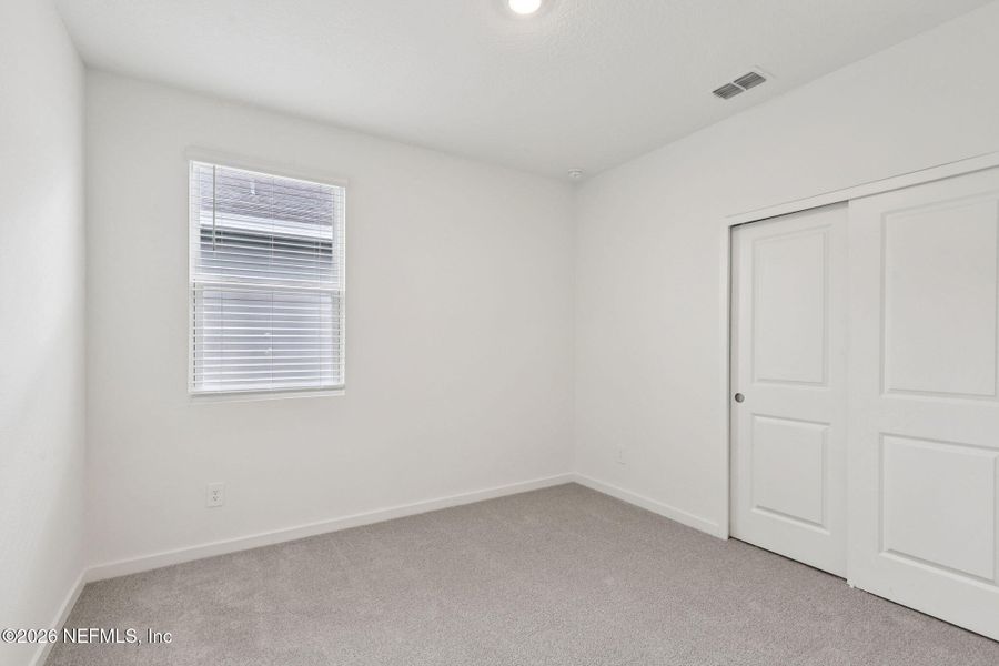 Spacious, unfurnished interior of a new home in Azalea Creek, Jacksonville (Image 17).