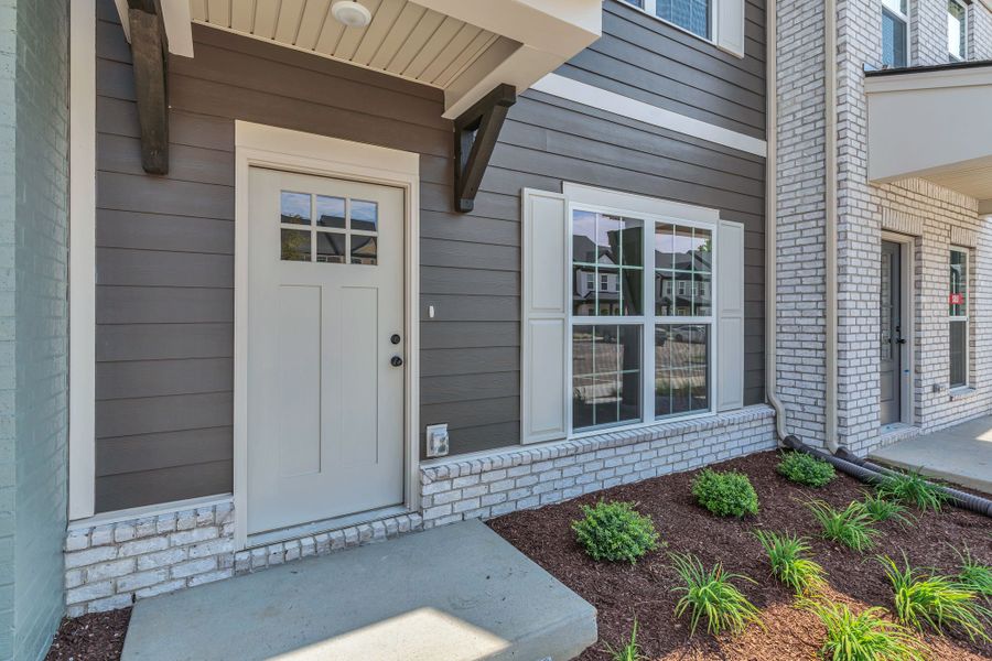 Front exterior of a new home in Oxford Station, Gallatin, TN, highlighting curb appeal (Image 14).