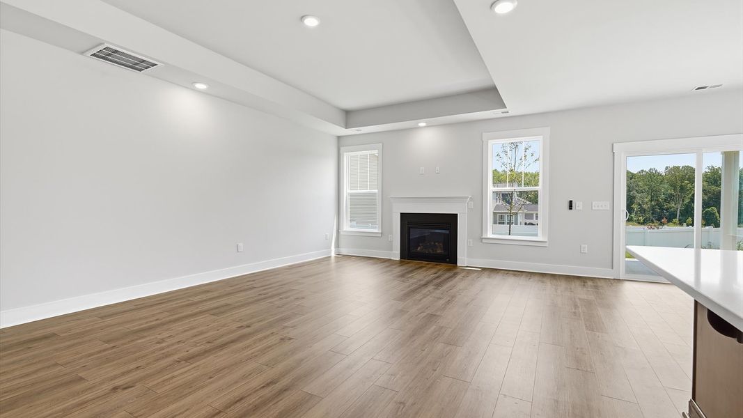 Hardwood flooring and high standards define this vibrant family room ideal for everyday living at Harrier Point Hardwood flooring and high standards define this vibrant family room ideal for everyday living at Harrier Point