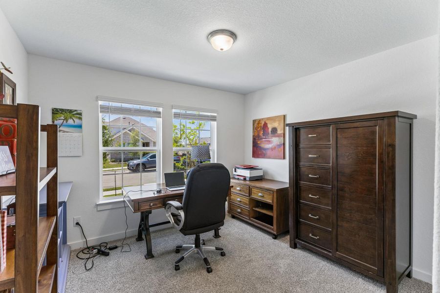 Room is set up as office - located at front of home with great natural lighting.
