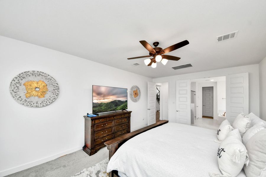 Peaceful primary suite designed for relaxation.