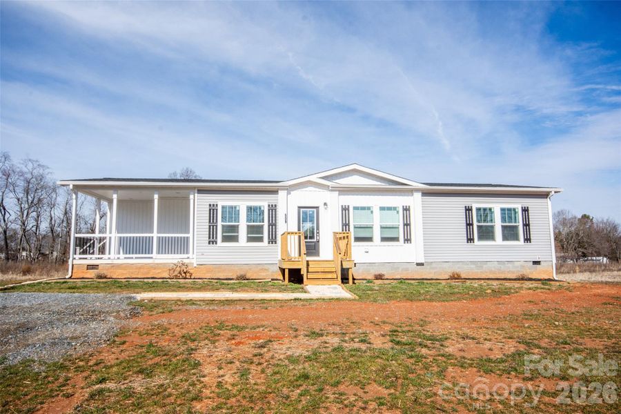 Exterior details and patio area of a home in , Hamptonville (Image 20).