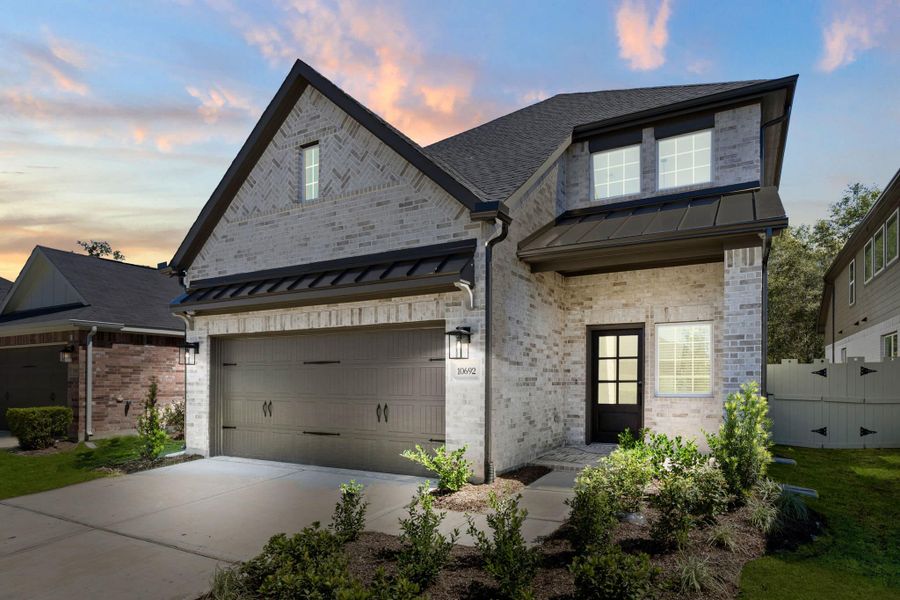 Front exterior of a new home in Wood Leaf Reserve, Tomball, TX, highlighting curb appeal (Image 28).