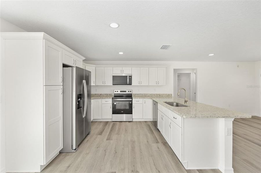 Furnished interior view inside a new home in , Dunnellon (Image 47).