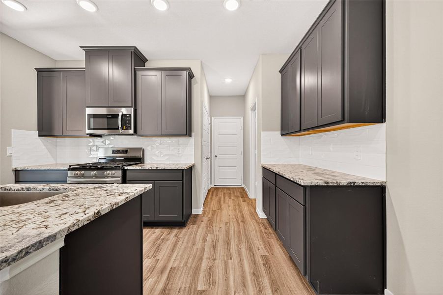 Furnished interior view inside a new home in Mill Creek Trails, Magnolia (Image 15). Furnished interior view inside a new home in Mill Creek Trails, Magnolia (Image 15).
