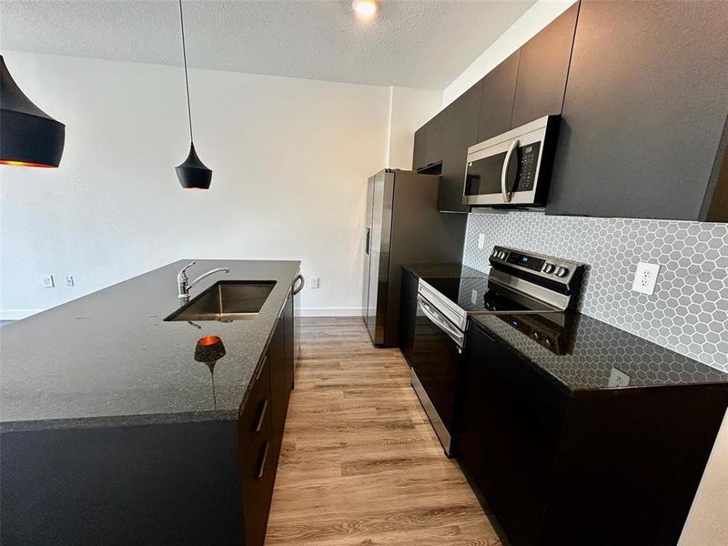 Furnished interior view inside a new home in , Kissimmee (Image 3).
