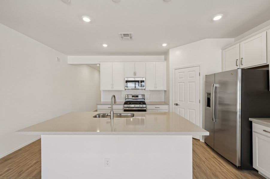Kitchen. Finishes and options may vary by community