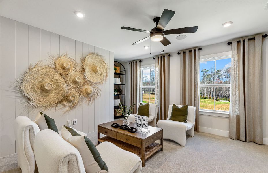 Representative furnished interior of a home built from the Woodward by Pulte Homes in Riversprings, Dacula (Image 12).