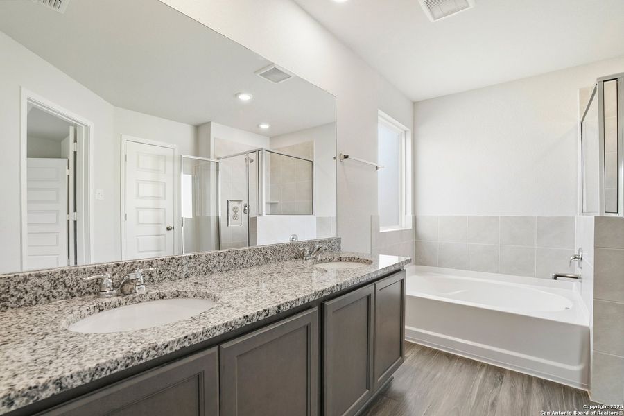 Furnished interior view inside a new home in Hunters Ranch, San Antonio (Image 9).