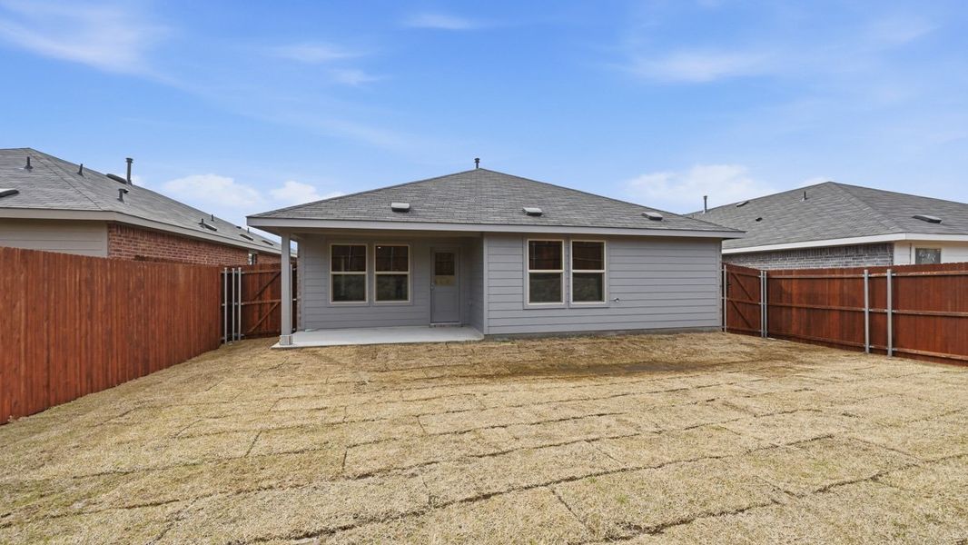 Exterior details and patio area of a home in Hickory Grove, Krum (Image 2).