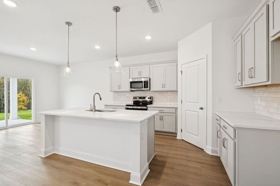 Representative furnished interior of a home built from the Montgomery by Ashton Woods in Cades Bluff, Lebanon (Image 5).