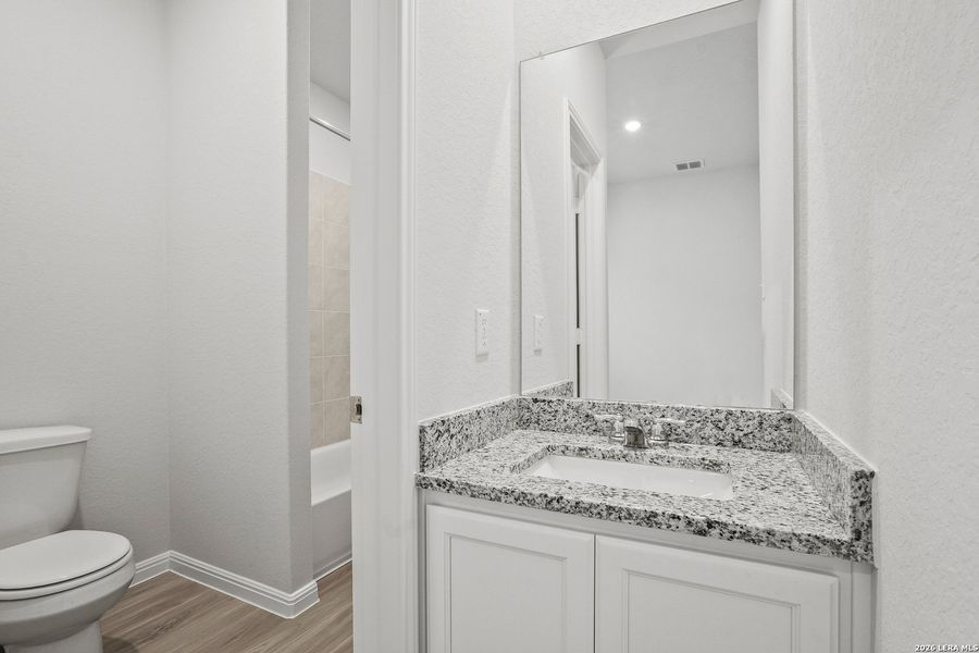 Furnished interior view inside a new home in Cinco Lakes, San Antonio (Image 12).