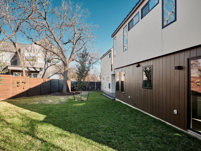 View of fenced backyard