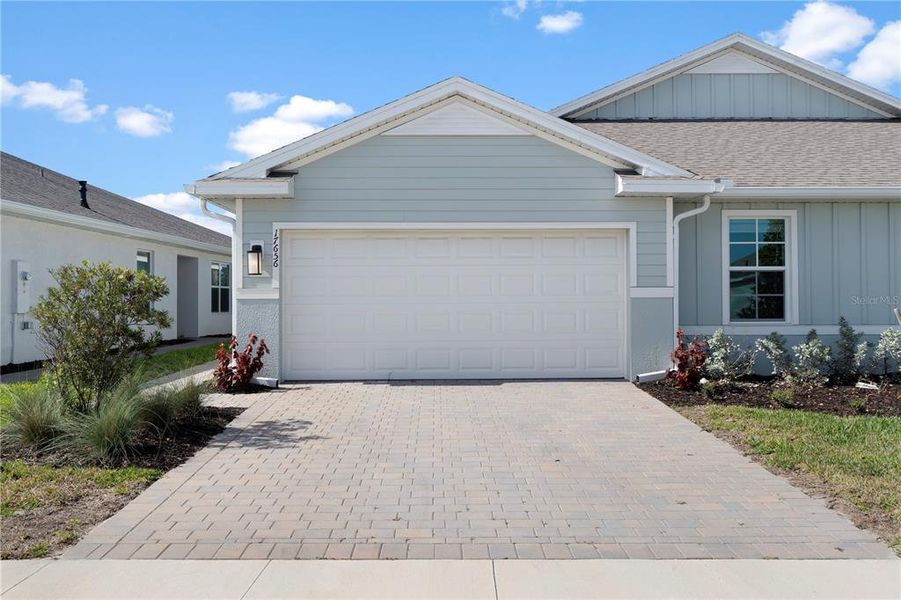 Front exterior of a new home in , Punta Gorda, FL, highlighting curb appeal (Image 2). Front exterior of a new home in , Punta Gorda, FL, highlighting curb appeal (Image 2).
