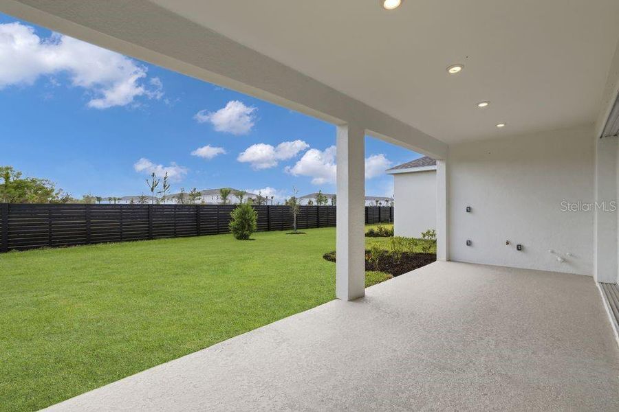 Exterior details and patio area of a home in Firethorn, Parrish (Image 3).