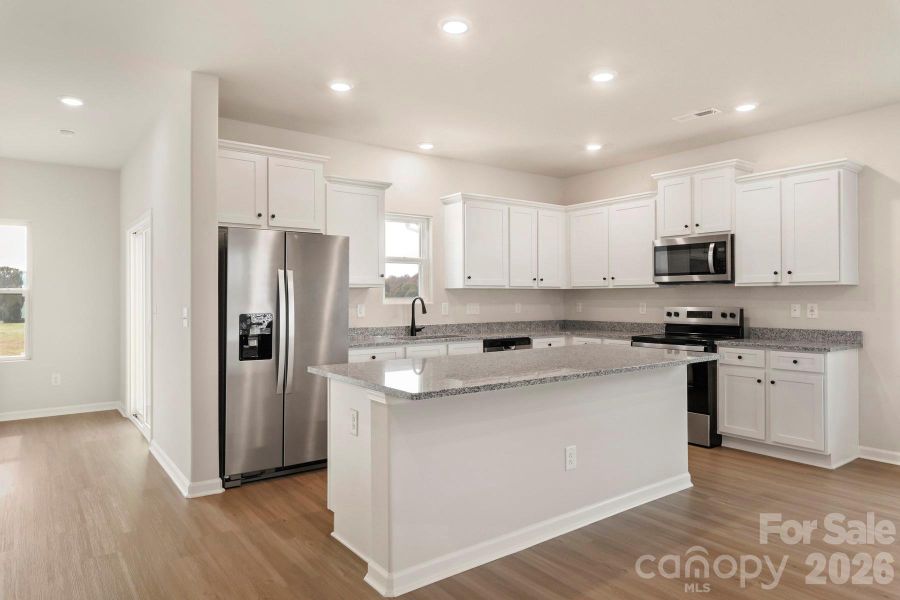 Furnished interior view inside a new home in Stagecoach Station, Gastonia (Image 6).